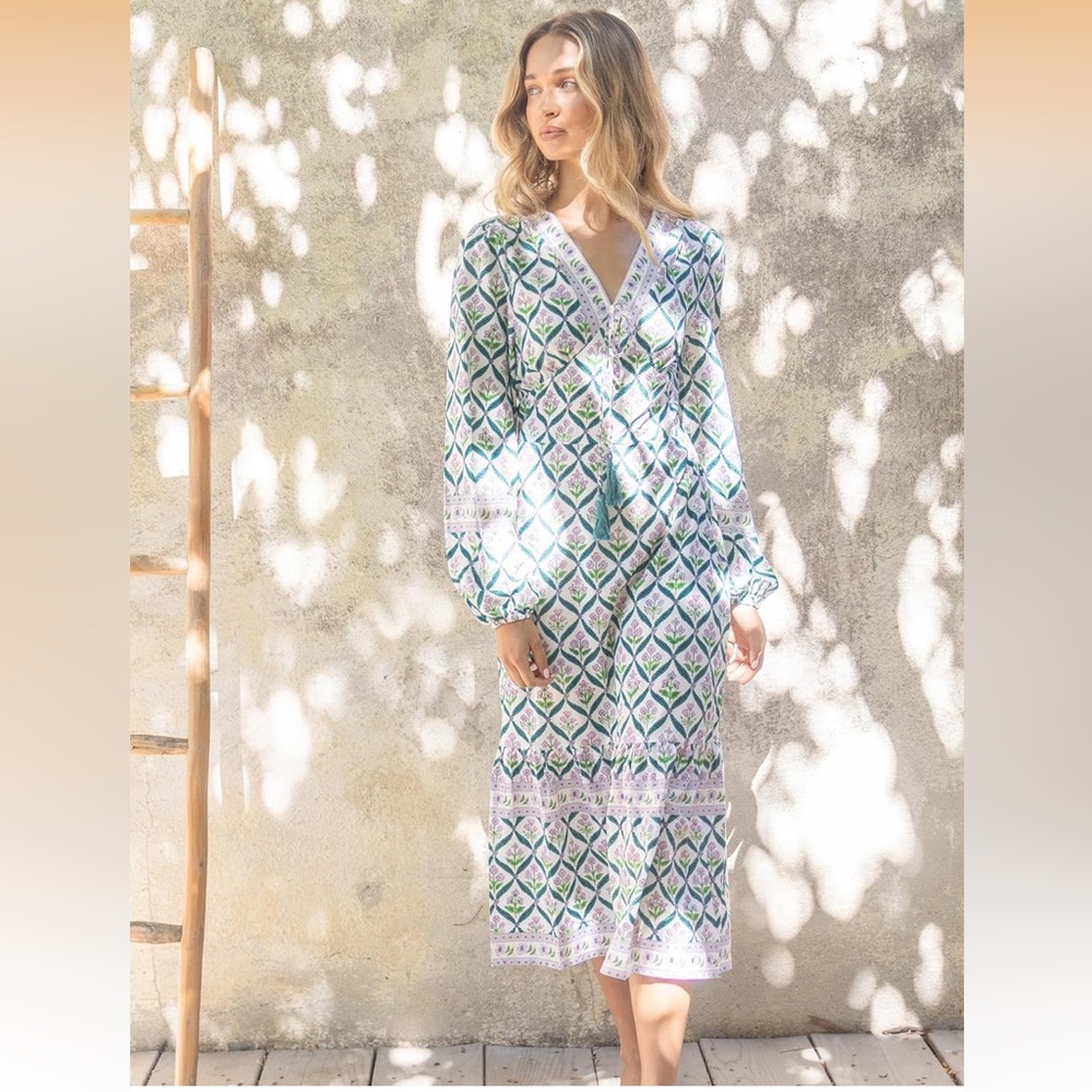 Sunny Spirit Maxi Boho Floral Print V Neck Flowy Tassel with Long Puff Sleeves.